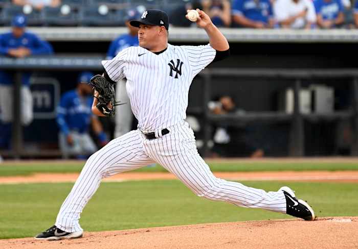Yankees SP Manny Banuelos pitching in spring training